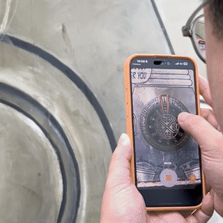 Interacting with an AR puzzle, turning dials